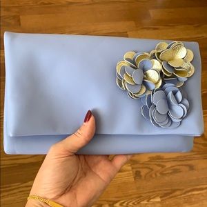 Agnés b. Baby blue 3D flower leather clutch bag.